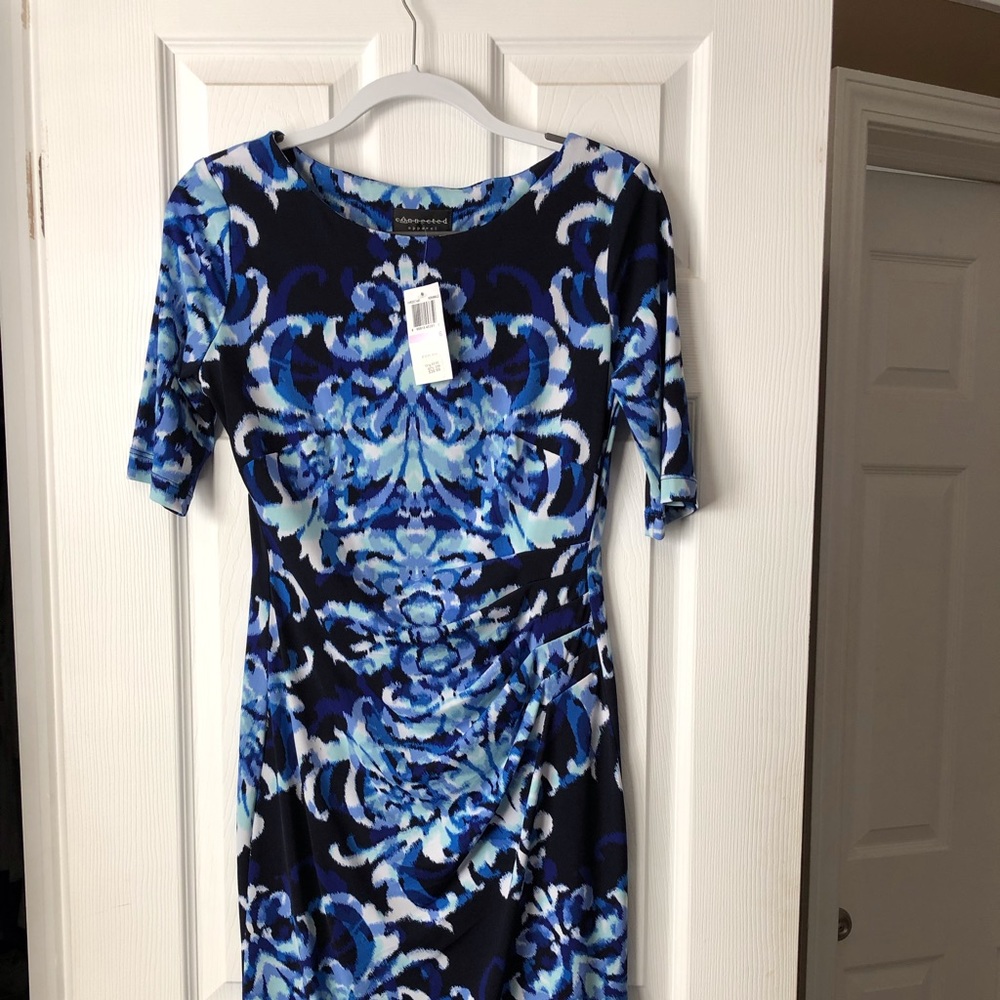 Black and blue, faux wrap dress.
